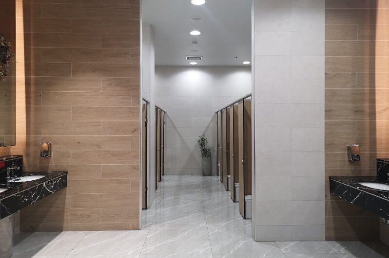 toilet partition wall finish with brown color wooden
